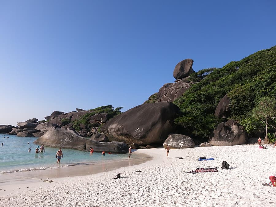 White sand and granite boulders on a beach in the Similan Islands